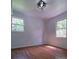 Bright bedroom features hardwood floors, two windows allowing natural light at 105 Timber Ridge Rd, Belmont, NC 28012