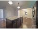 Modern kitchen featuring granite countertops, a center island and stainless steel appliances at 105 Timber Ridge Rd, Belmont, NC 28012