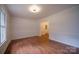 Bright living room features hardwood floors, natural light, and classic white trim at 105 Timber Ridge Rd, Belmont, NC 28012