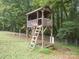 Wooden treehouse featuring ladder access, and a roof at 105 Timber Ridge Rd, Belmont, NC 28012