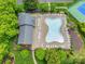 Overhead shot of a community clubhouse, pool, lounging area, and lush landscaping at 1102 High Brook Dr, Waxhaw, NC 28173