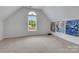 Minimalist bedroom featuring a window and a framed illustration set for stylish aesthetics at 1102 High Brook Dr, Waxhaw, NC 28173