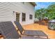 Wooden deck with lounge chairs, showcasing an outdoor space perfect for relaxing and entertaining at 1102 High Brook Dr, Waxhaw, NC 28173