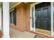 Front door entrance with sidelight windows, and a brass kick plate at 1102 High Brook Dr, Waxhaw, NC 28173