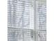 Window blinds are down allowing some light to pass through at 1102 High Brook Dr, Waxhaw, NC 28173