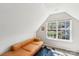 Well-lit bonus room with a unique window at 11615 Hidden Grove Trl, Charlotte, NC 28215