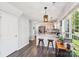 Bright kitchen featuring stainless steel appliances, granite countertops, and hardwood floors at 11615 Hidden Grove Trl, Charlotte, NC 28215