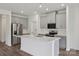 Modern kitchen featuring gray cabinets, stainless steel appliances, a central island with white countertop, and stylish backsplash at 1234 Morehead Dr, Salisbury, NC 28144