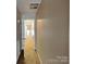 Hallway with carpet and neutral paint is well lit and connects all rooms on the floor at 1240 Periwinkle Dr, Waxhaw, NC 28173