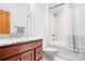 Clean bathroom featuring tiled shower-tub combo, granite vanity, and a neutral color palette at 127 Castle Dr, Mooresville, NC 28117
