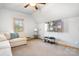Finished bedroom space with TV, vaulted ceilings, comfortable seating, and natural light at 127 Castle Dr, Mooresville, NC 28117