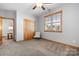 Neutral bedroom with light gray walls, wood trim, closet, and lots of natural light at 127 Castle Dr, Mooresville, NC 28117