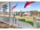 View from front porch showing neighborhood and a well-manicured lawn at 127 Castle Dr, Mooresville, NC 28117