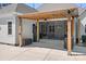 Covered patio with fan, outdoor seating, and a grill; perfect for outdoor entertaining at 127 Castle Dr, Mooresville, NC 28117