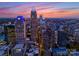 Panoramic aerial shot capturing the building surrounded by the vibrant city skyline at sunset at 127 N Tryon St # 615, Charlotte, NC 28202