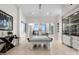 Bright game room featuring a white pool table, bar, and city views at 127 N Tryon St # 615, Charlotte, NC 28202