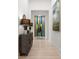 Stylish hallway with a decorative buffet table and art, creating an inviting atmosphere at 127 N Tryon St # 615, Charlotte, NC 28202