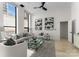 Living room with city views, a modern design, and lots of natural light at 127 N Tryon St # 615, Charlotte, NC 28202