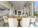 Spacious open-concept layout with a dining area, living room, and kitchen, perfect for modern living at 127 N Tryon St # 615, Charlotte, NC 28202