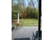 Backyard view with a patio, dining area, and lush landscaping at 146 Saluda St, Chester, SC 29706