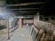 Unfinished basement featuring brick foundation and visible utilities, providing a blank canvas for customization at 146 Saluda St, Chester, SC 29706