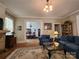 Inviting living room with a fireplace and view into the dining area at 146 Saluda St, Chester, SC 29706