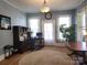 Bright office with hardwood floors, natural light, and ample workspace at 146 Saluda St, Chester, SC 29706