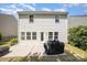 View of backyard with patio, grill, privacy fence, and lush greenery creating a serene outdoor space at 15619 Lakepoint Forest Dr, Charlotte, NC 28278