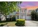 Charming two-story home with a well-manicured lawn and attached two-car garage at 15619 Lakepoint Forest Dr, Charlotte, NC 28278