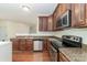 Well-equipped kitchen with stainless appliances, granite countertops and great layout at 15619 Lakepoint Forest Dr, Charlotte, NC 28278