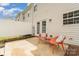 Cozy patio with stylish outdoor seating, surrounded by a privacy fence and well-maintained landscaping at 1720 Chamberside Dr, Rock Hill, SC 29730