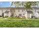 Expansive backyard with well-manicured lawn, patio, storage shed, and ample green space at 1720 Chamberside Dr, Rock Hill, SC 29730