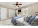 Bedroom featuring a cozy bed, dresser, wall-mounted TV, and a comfortable seating area for relaxation at 1720 Chamberside Dr, Rock Hill, SC 29730