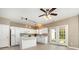 Charming kitchen with white cabinets, modern appliances, and an island for meal prep and extra space at 1720 Chamberside Dr, Rock Hill, SC 29730