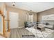 Inviting living room featuring wood floors, natural light, comfortable seating and a welcoming front door entrance at 1720 Chamberside Dr, Rock Hill, SC 29730