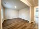Bright, spacious living room featuring hardwood floors and neutral walls with ample natural light at 1986 Paddlewheel Dr, Stanley, NC 28164