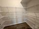 Walk-in pantry with ample wire shelving for organized storage of food and household items at 1986 Paddlewheel Dr, Stanley, NC 28164