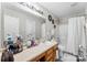 This bathroom has a shower, toilet, and sink with a mirror above the sink at 2011 Dunsmore Ln # 137, Waxhaw, NC 28173