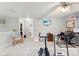 Upstairs bonus room includes a ceiling fan, closet, and views to the bathroom at 2011 Dunsmore Ln # 137, Waxhaw, NC 28173