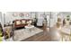 Cozy living room showcasing hardwood floors, elegant furnishings, and a well-lit, inviting atmosphere at 2011 Dunsmore Ln # 137, Waxhaw, NC 28173
