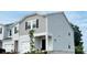Charming two-story home boasts a covered front porch and attached garage at 2020 Old Rivers Rd, Concord, NC 28027