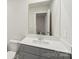 Bathroom with gray vanity, white countertop, and white toilet at 2070 Old Rivers Rd, Concord, NC 28027