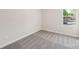 Bedroom with plush carpet and natural light from the large window at 2070 Old Rivers Rd, Concord, NC 28027