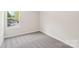 Bedroom with plush carpet and natural light from the large window at 2070 Old Rivers Rd, Concord, NC 28027