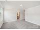 Bright bedroom featuring neutral paint and plush carpet at 2070 Old Rivers Rd, Concord, NC 28027