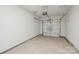 An attached one-car garage featuring an automatic door provides secure parking and storage at 2070 Old Rivers Rd, Concord, NC 28027