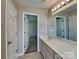 This bathroom features a large vanity, neutral paint, and tile flooring at 2122 Shumard Cir, Indian Trail, NC 28079