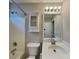 This bathroom features a tub shower, vanity, toilet and medicine cabinet at 2122 Shumard Cir, Indian Trail, NC 28079