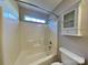 This bathroom features a tub shower, toilet and medicine cabinet at 2122 Shumard Cir, Indian Trail, NC 28079