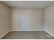 This bedroom features carpet flooring and neutral paint at 2122 Shumard Cir, Indian Trail, NC 28079